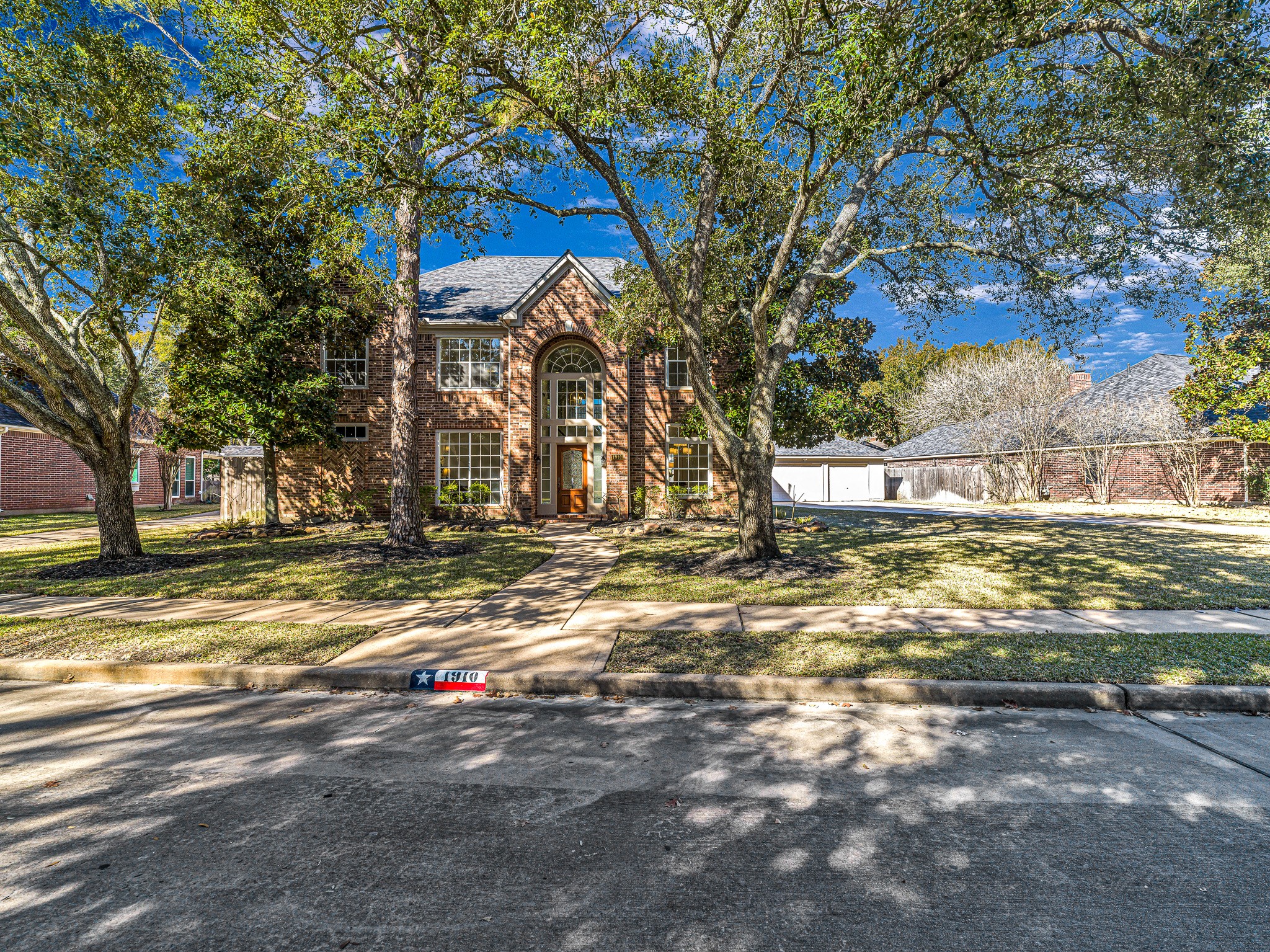 1910 Landon Point Circle Katy, TX 77450 - Photo 4 of 37 Enjoy a neighborhood with mature trees, sidewalks, walking trails, community pools, golf course...
