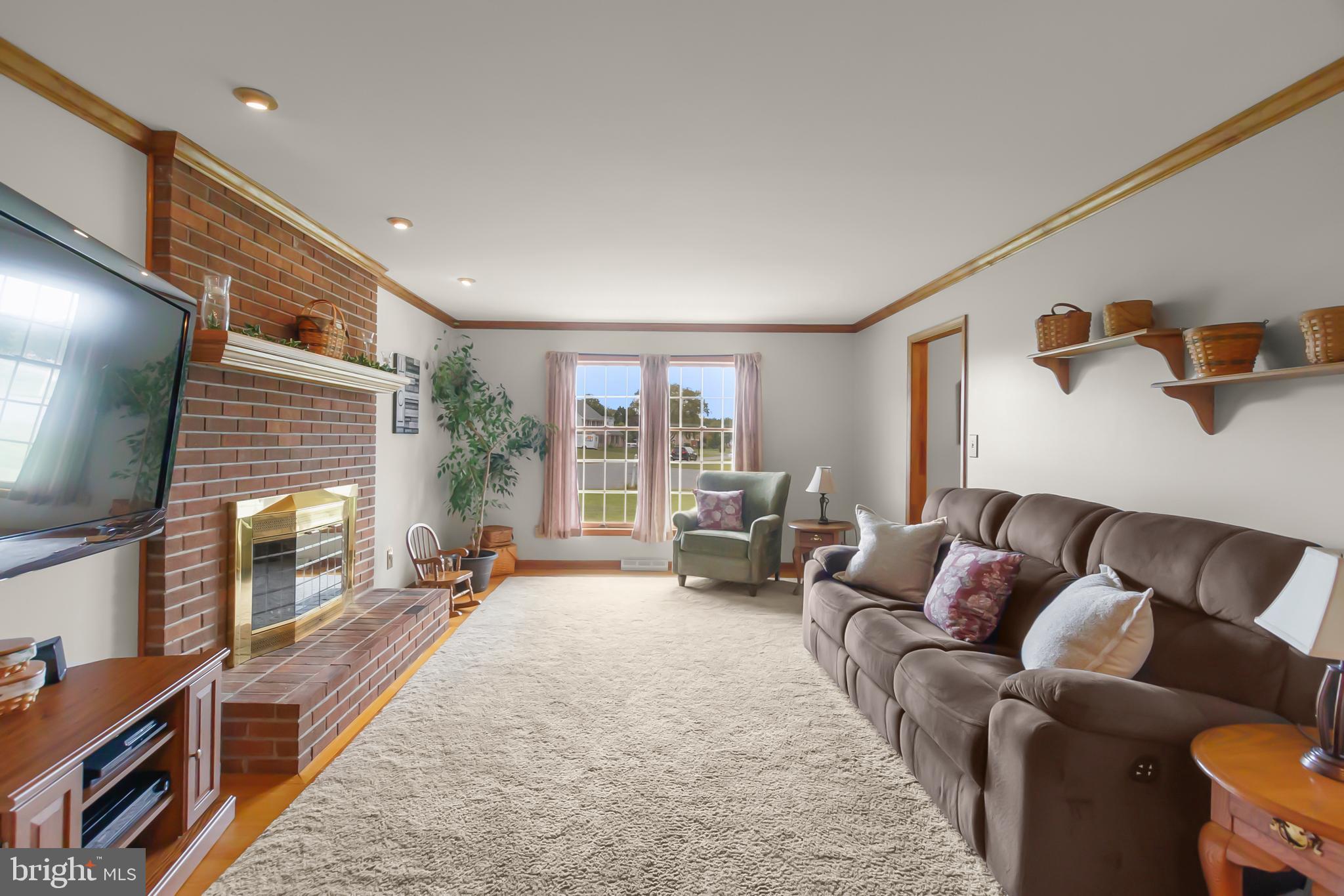 8 Wortham Court Bear, DE 19701 - Photo 9 of 71 a living room with furniture and a flat screen tv