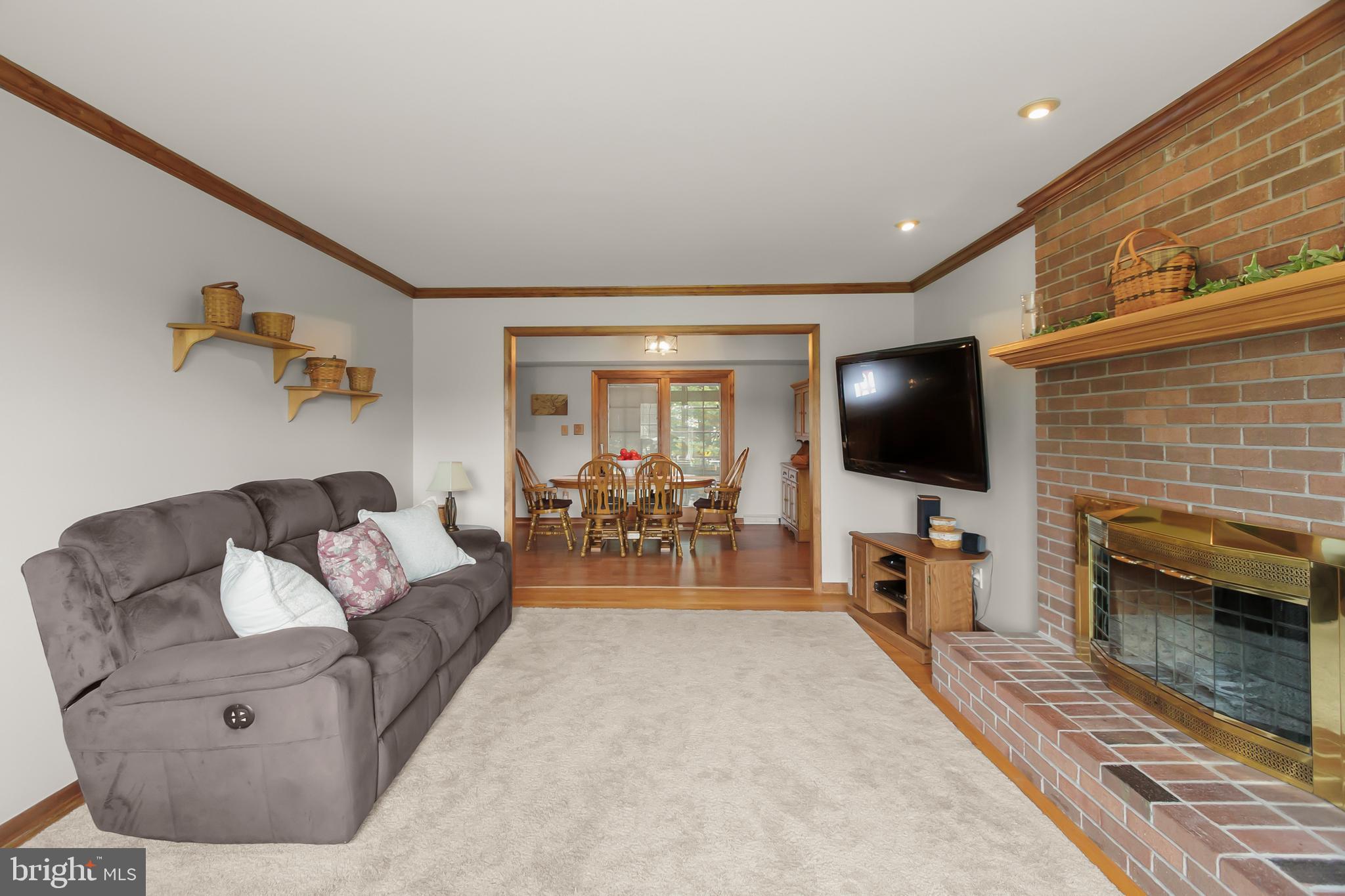 8 Wortham Court Bear, DE 19701 - Photo 10 of 71 a living room with furniture and a flat screen tv