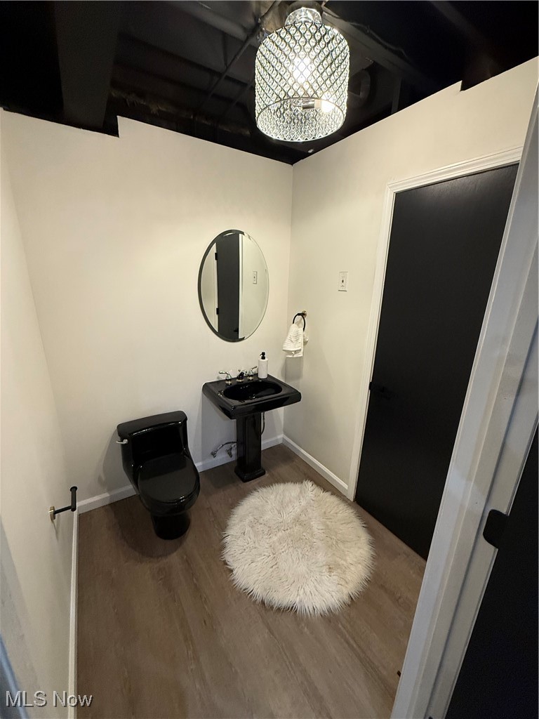 31295 Arthur Road Solon, OH 44139 - Photo 43 of 50 Bathroom featuring hardwood / wood-style flooring and toilet