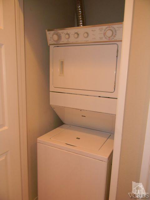 11525 Treeview Court Moorpark, CA 93021 - Photo 17 of 17 a utility room with dryer and washer
