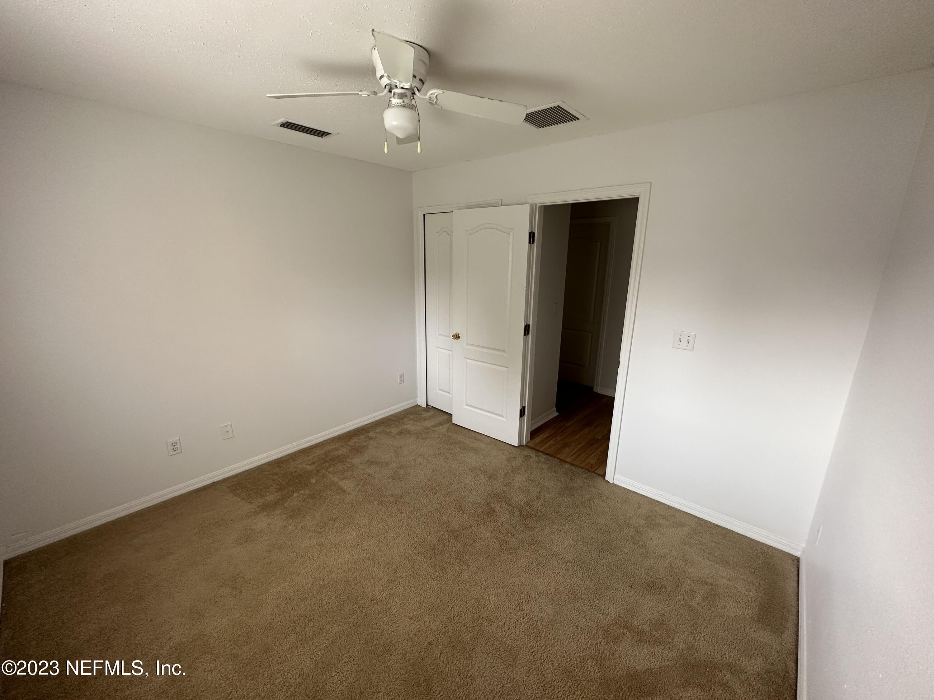 744 Ginger Mill Drive St. Johns, FL 32259 - Photo 11 of 28 a view of an empty room