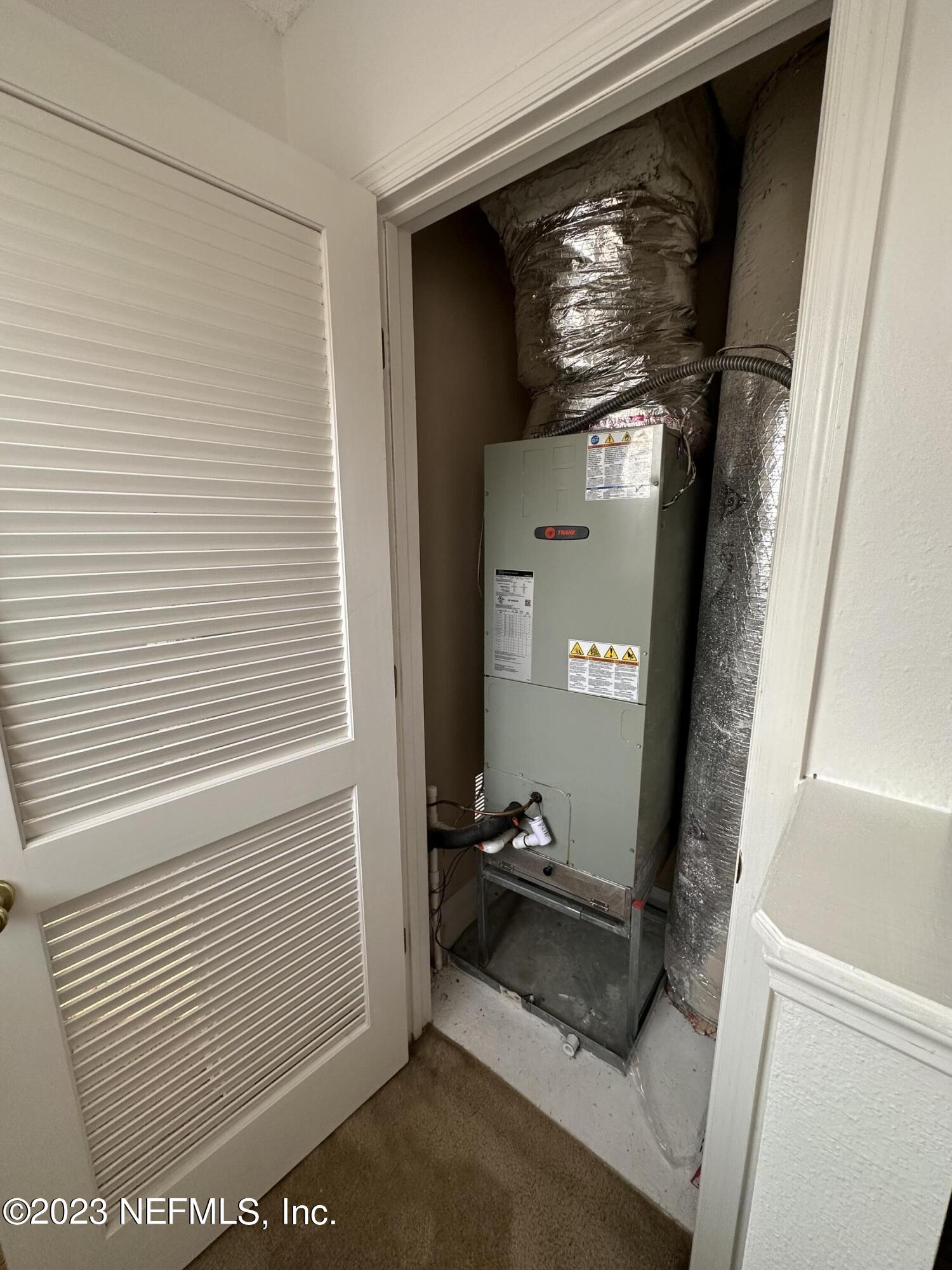 744 Ginger Mill Drive St. Johns, FL 32259 - Photo 15 of 28 a view of a hallway with entryway