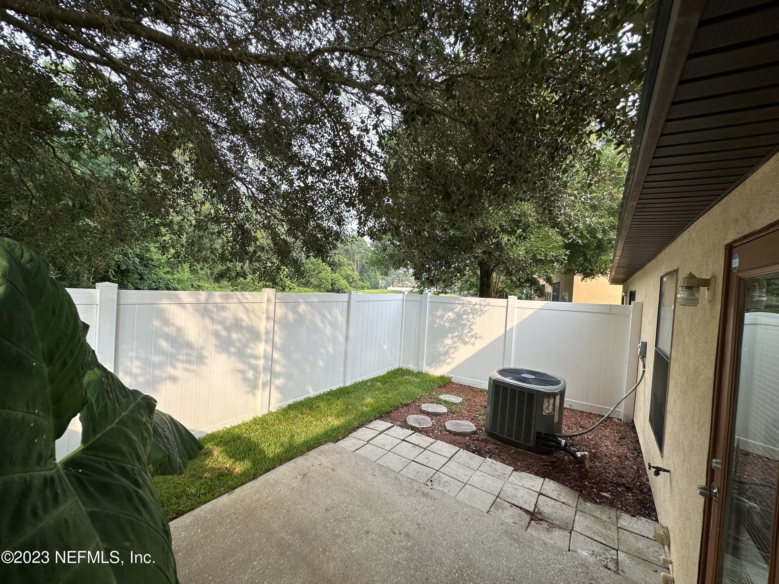 744 Ginger Mill Drive St. Johns, FL 32259 - Photo 23 of 28 a view of an outdoor space with seating area