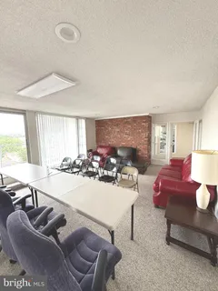 a room with a table and chairs