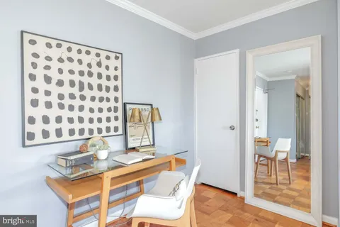 a view of a kitchen with granite countertop a dining table and chairs
