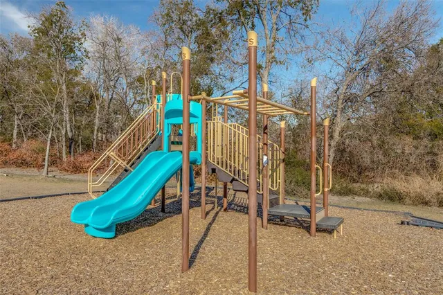 a view of a park with a slide
