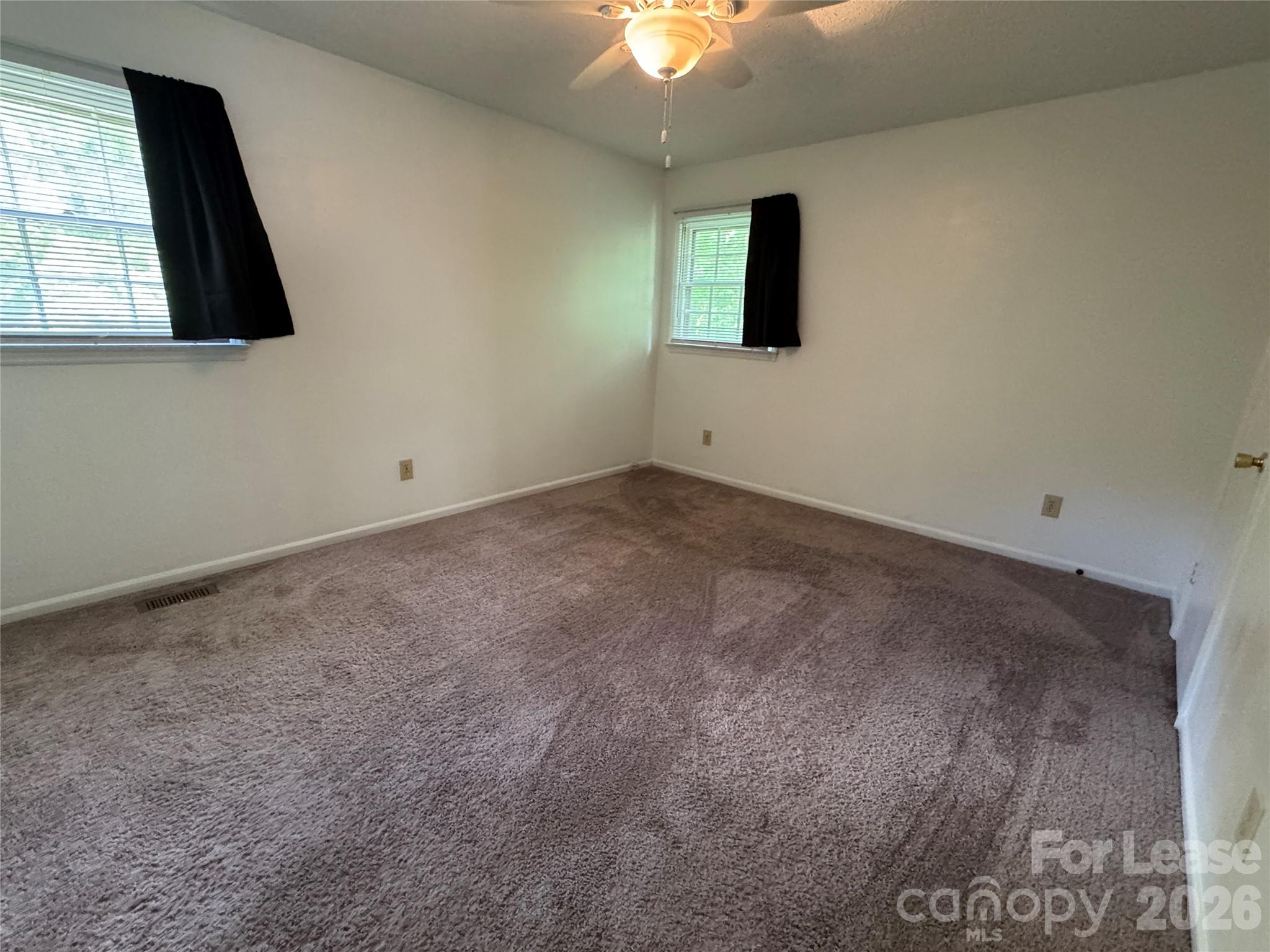 315 Pine Road Mount Holly, NC 28120 - Photo 7 of 21 an empty room with a window