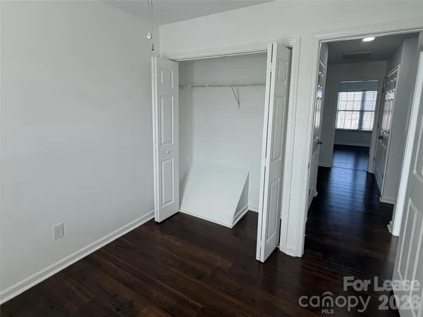 wooden floor in a hall with an entryway