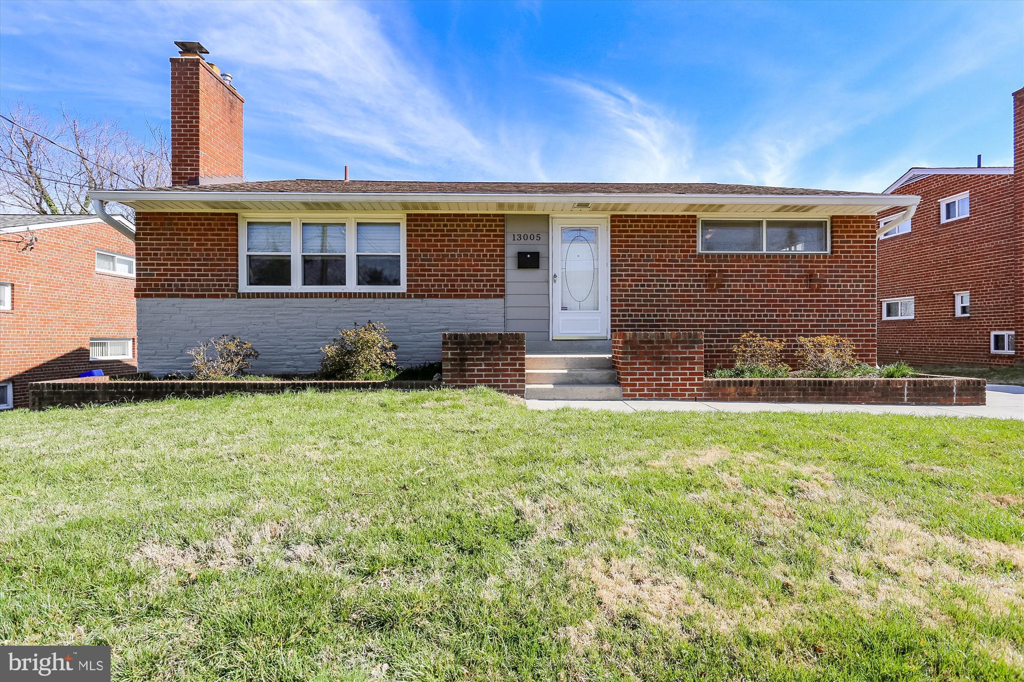 13005 Carney Street Silver Spring, MD 20906 - Photo 1 of 30 a front view of a house with a yard