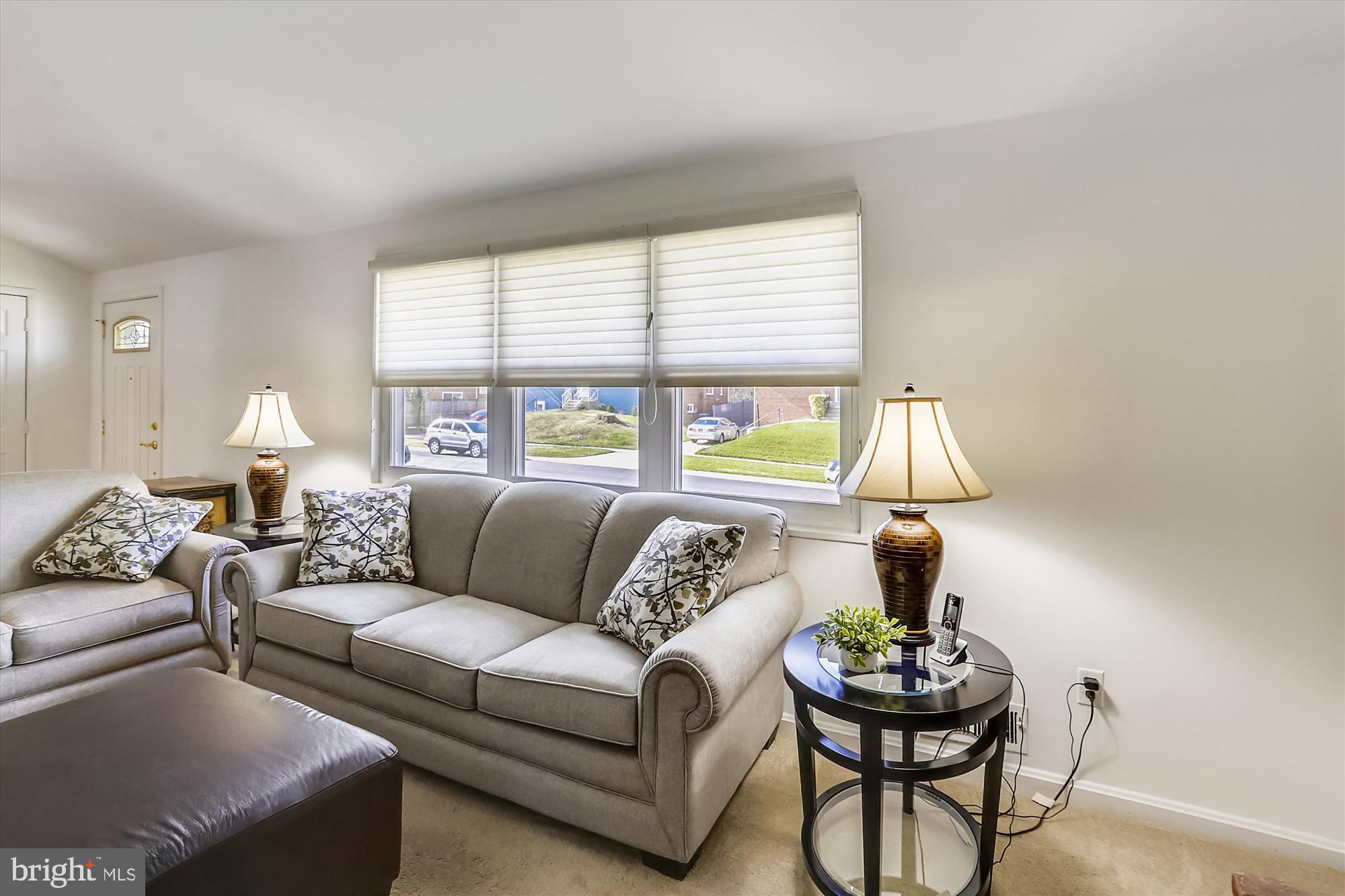 13005 Carney Street Silver Spring, MD 20906 - Photo 13 of 30 a living room with furniture and a large window