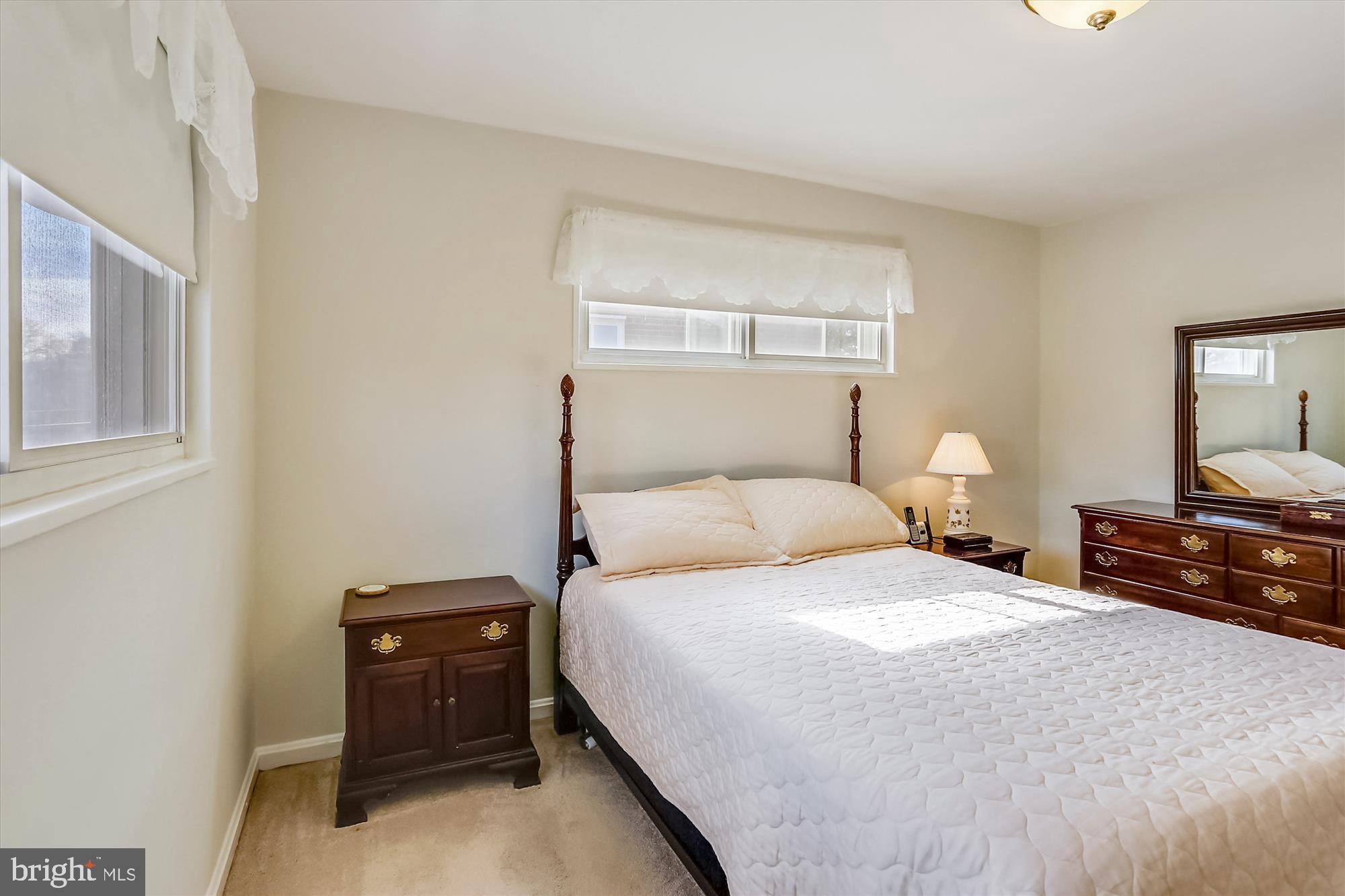 13005 Carney Street Silver Spring, MD 20906 - Photo 15 of 30 a bedroom with a bed and a dresser