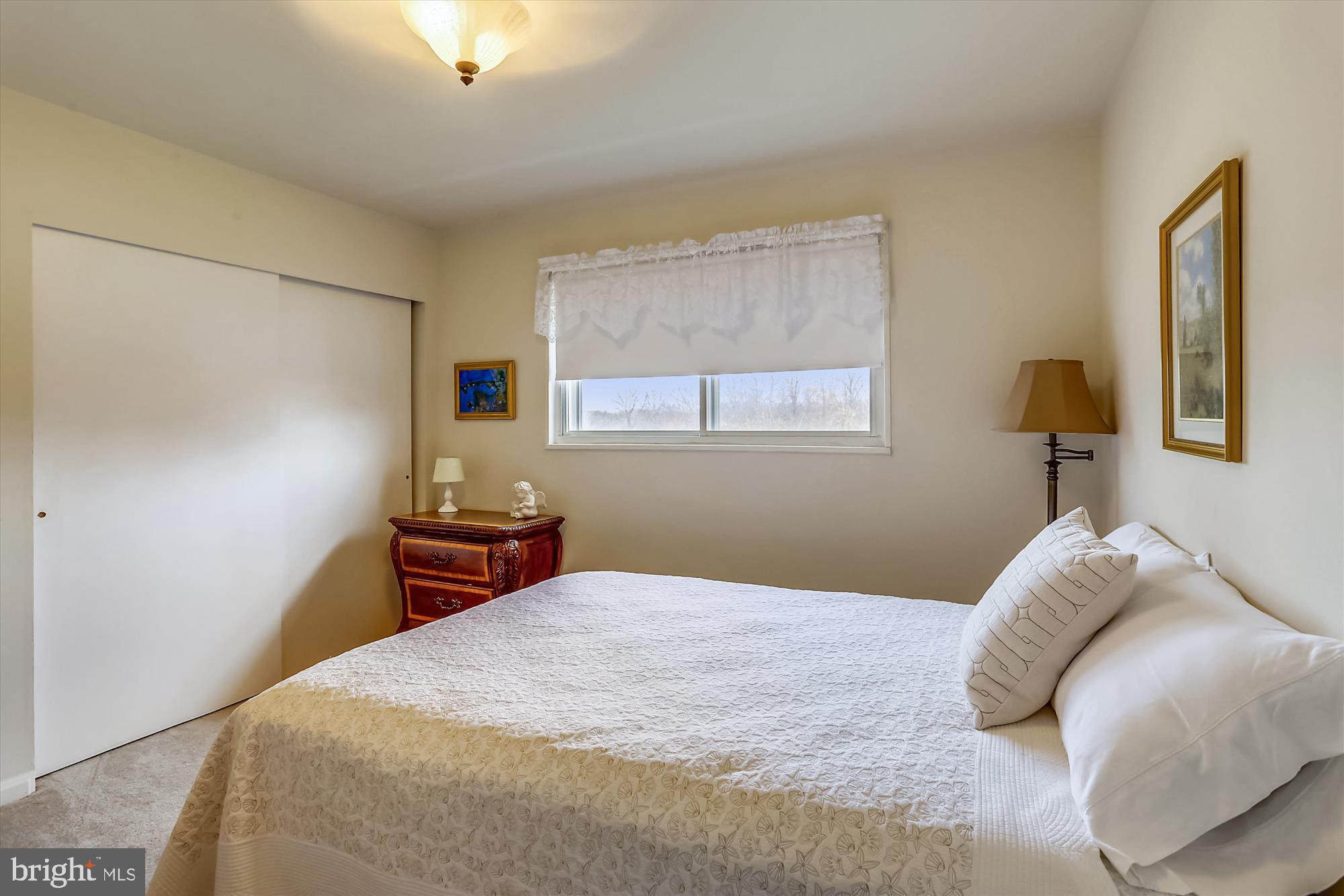 13005 Carney Street Silver Spring, MD 20906 - Photo 21 of 30 a bedroom with a bed and a window