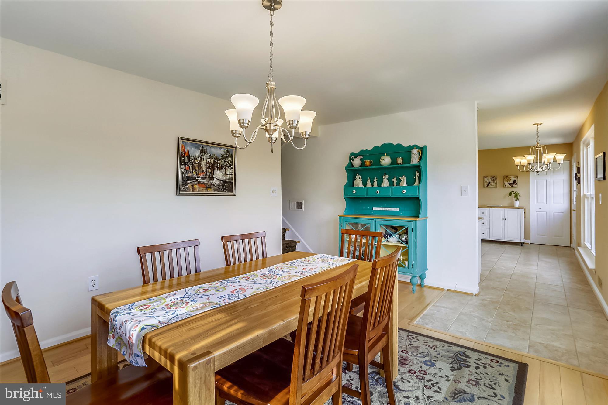13005 Carney Street Silver Spring, MD 20906 - Photo 8 of 30 a view of a dining room with furniture and chandelier