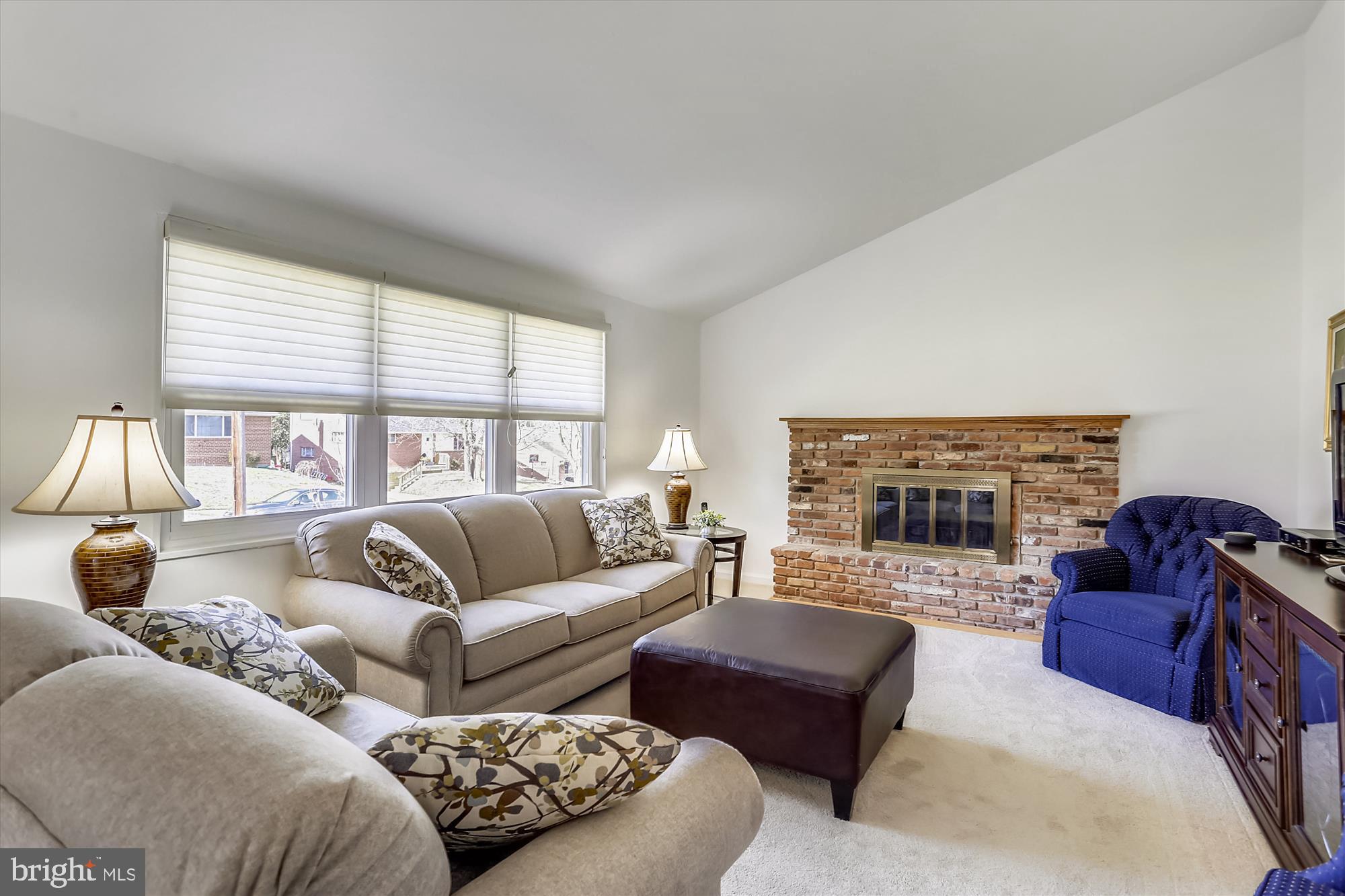 13005 Carney Street Silver Spring, MD 20906 - Photo 10 of 30 a living room with furniture fireplace and a large window