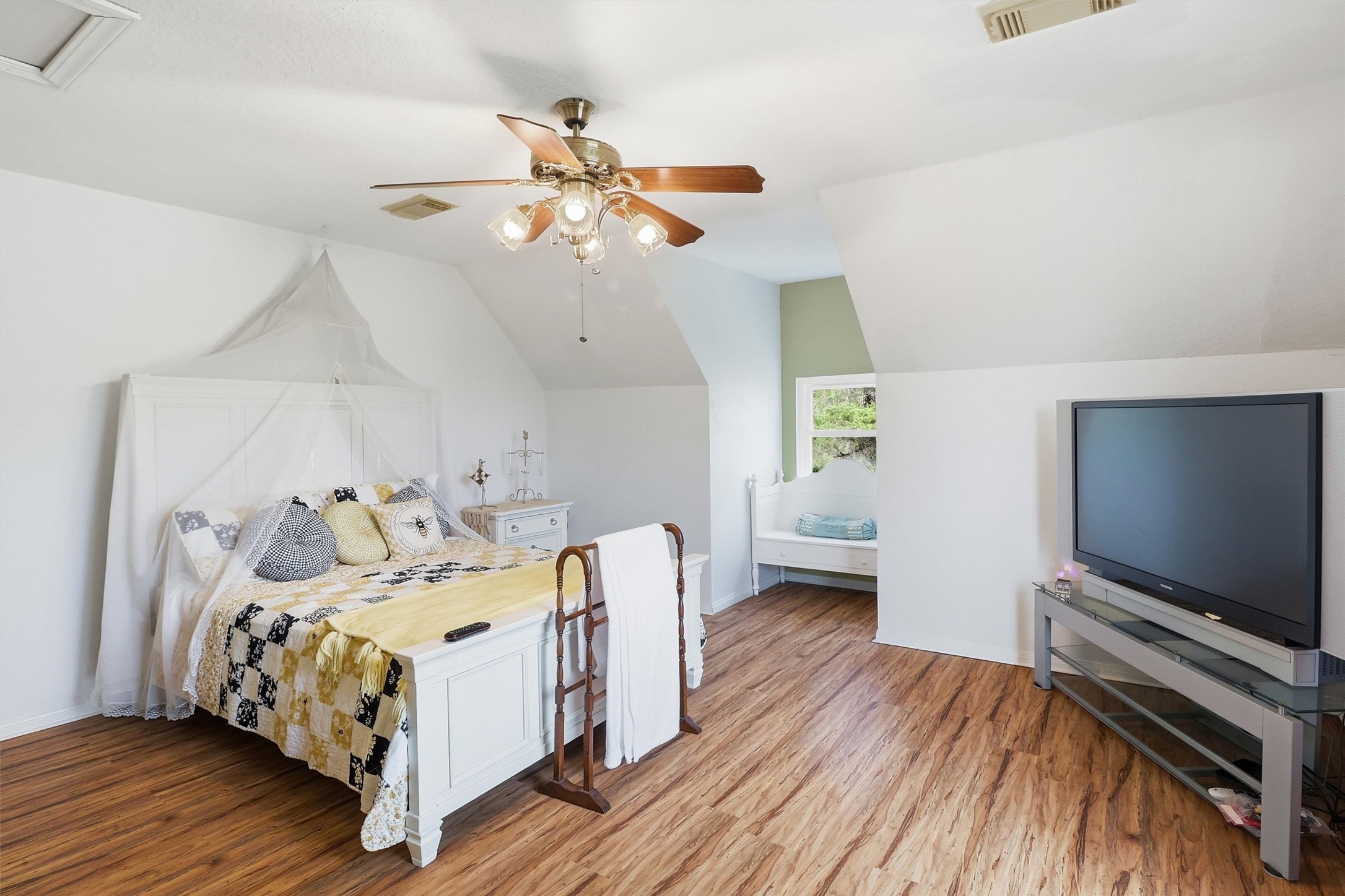 2325 Skrivanek Road Sealy, TX 77474 - Photo 11 of 36 a bedroom with a bed and a flat screen tv