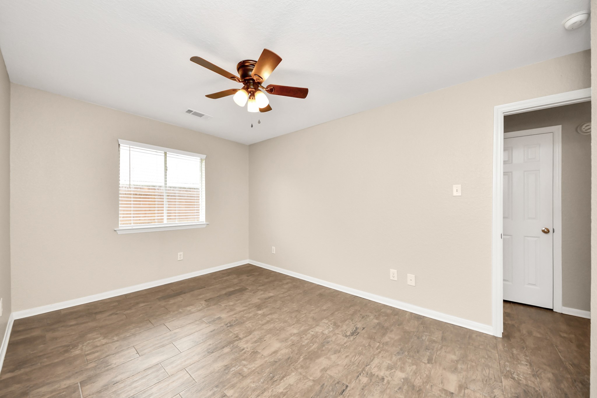 14610 Hazy Ridge Lane Cypress, TX 77429 - Photo 33 of 44 Bedroom 3 offers comfortable living space, abundant natural light, and a versatile layout ideal for family, guests, or a home office.