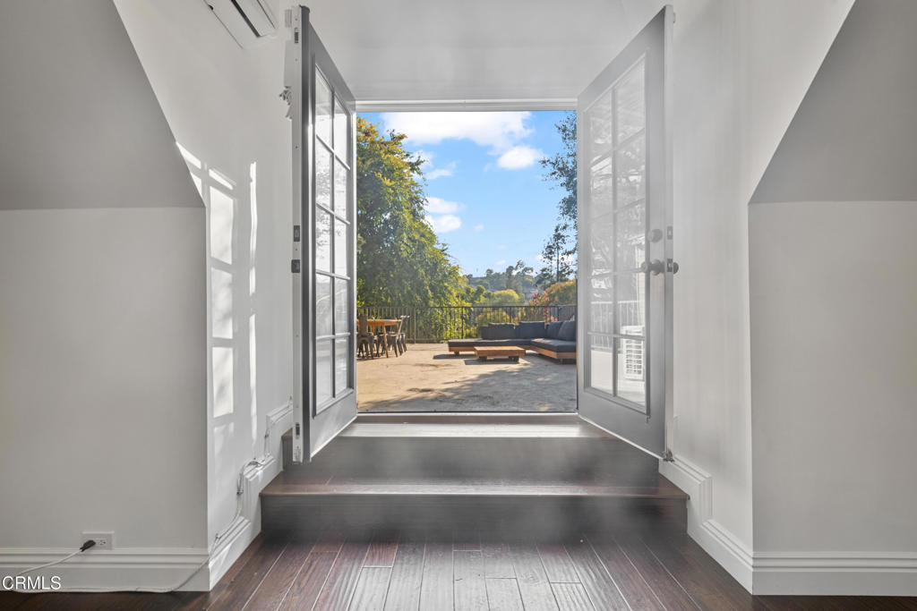 263 San Miguel Road Pasadena, CA 91105 - Photo 18 of 28 a view of a living room and a floor to ceiling window