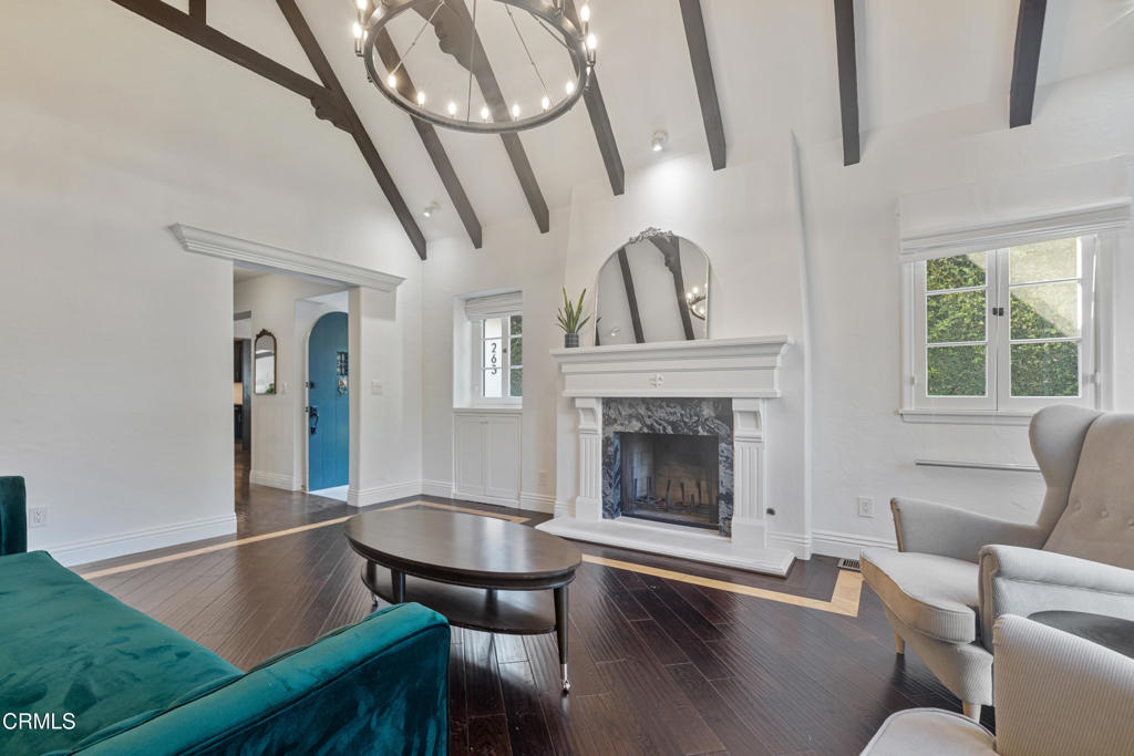 263 San Miguel Road Pasadena, CA 91105 - Photo 5 of 28 a living room with furniture and a fireplace
