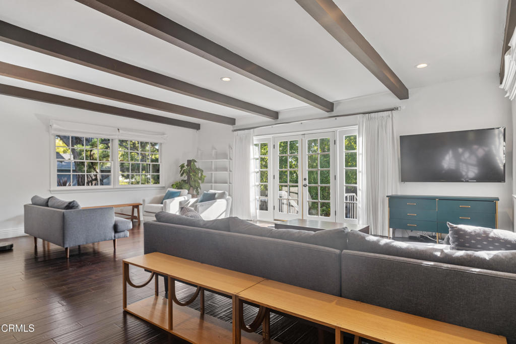 263 San Miguel Road Pasadena, CA 91105 - Photo 8 of 28 a living room with furniture and a large window