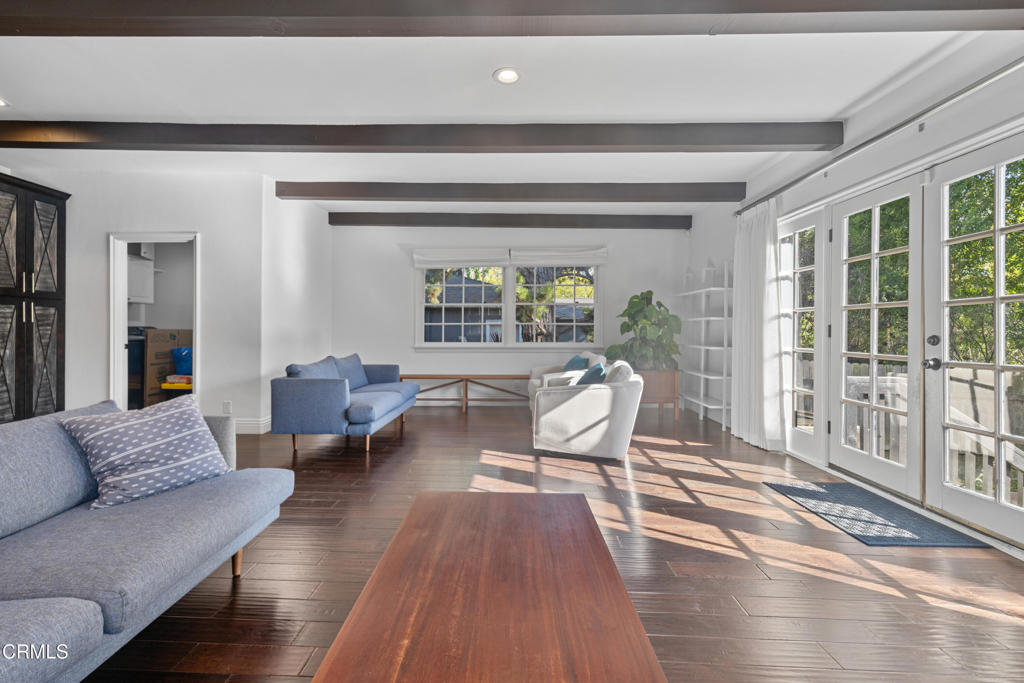 263 San Miguel Road Pasadena, CA 91105 - Photo 9 of 28 a living room with furniture and a large window