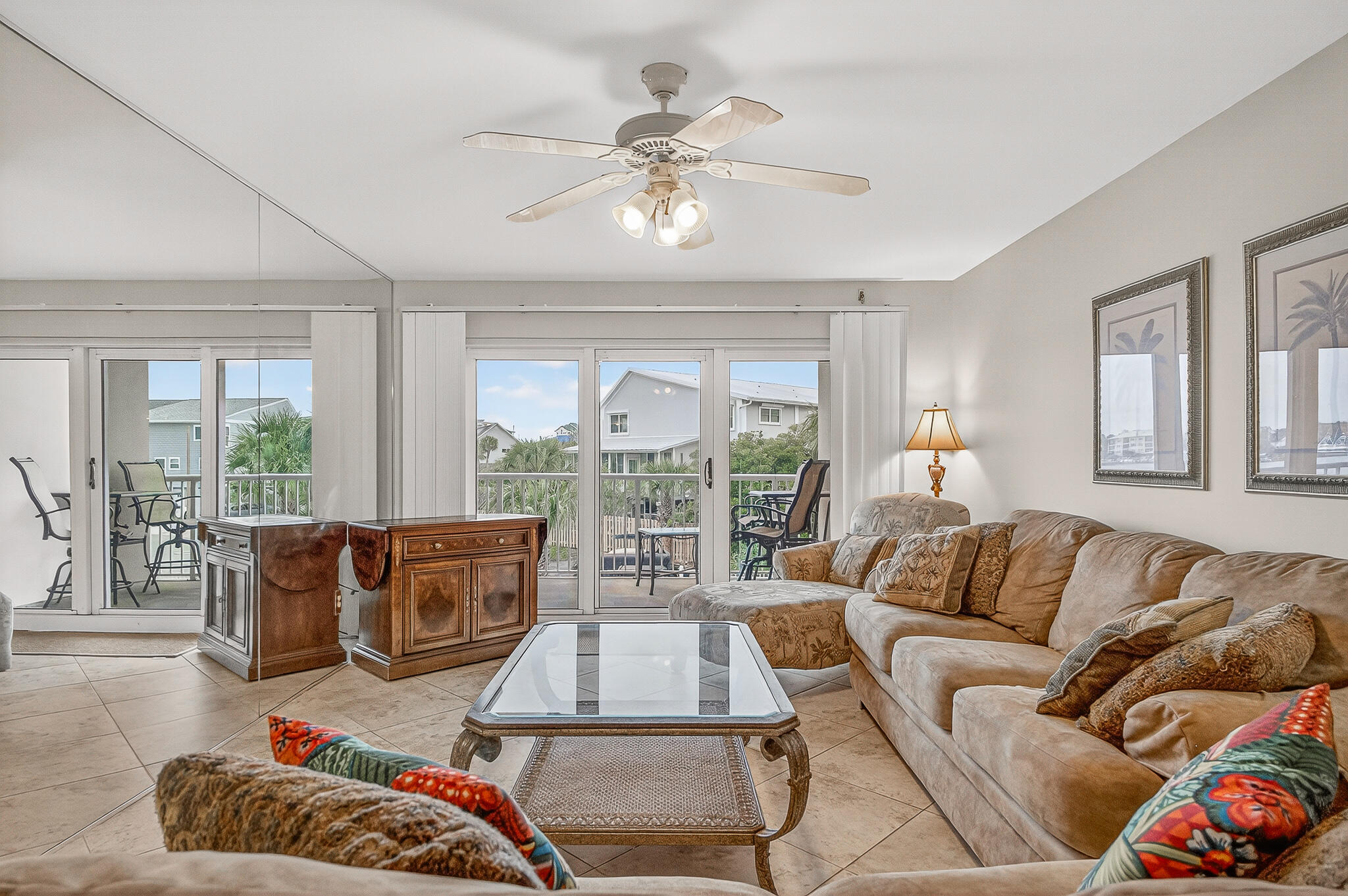 195 Durango Road, Unit 2D Destin, FL 32541 - Photo 1 of 62 a living room with furniture and floor to ceiling windows