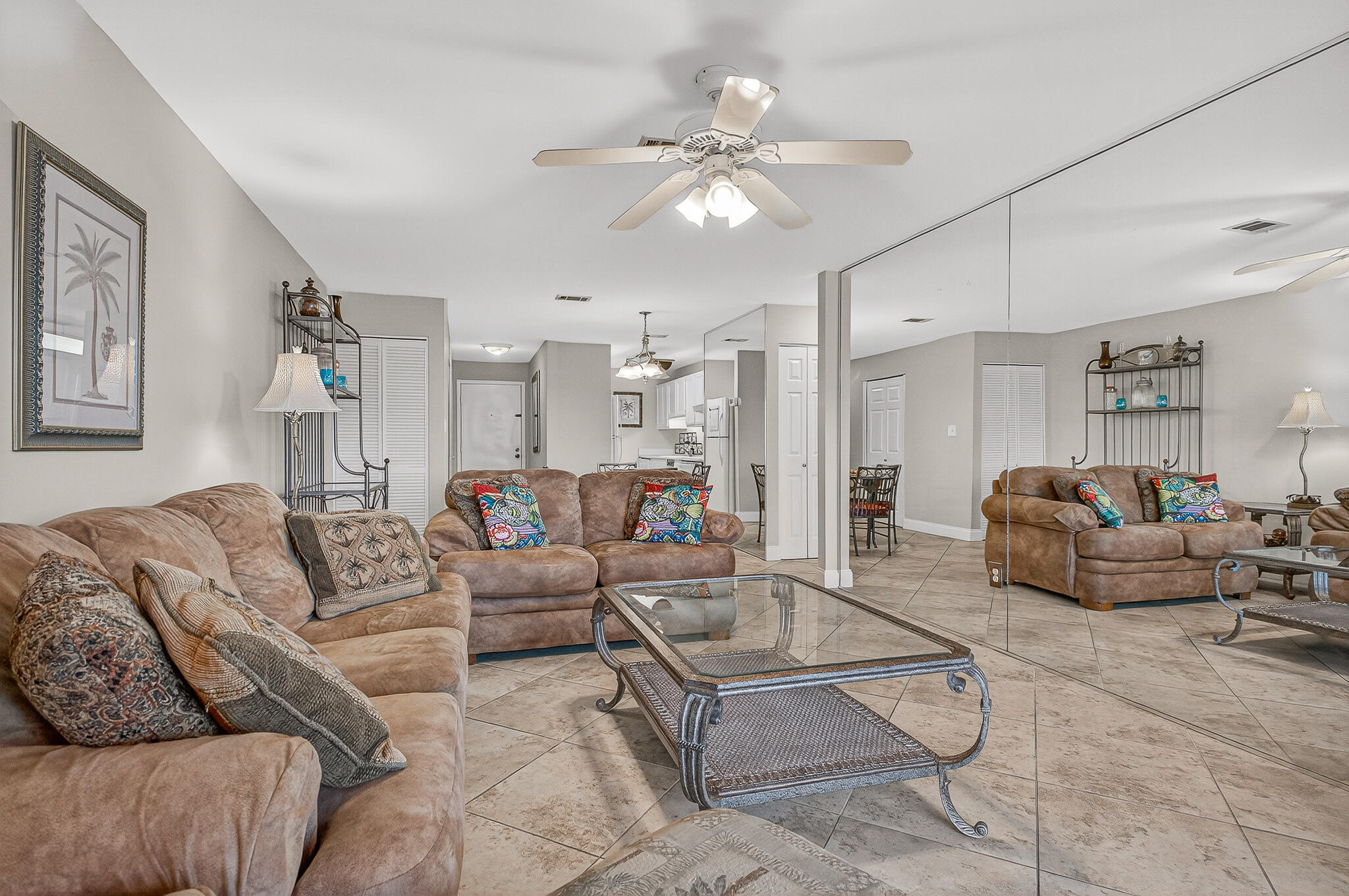 195 Durango Road, Unit 2D Destin, FL 32541 - Photo 35 of 62 a living room with furniture and a chandelier