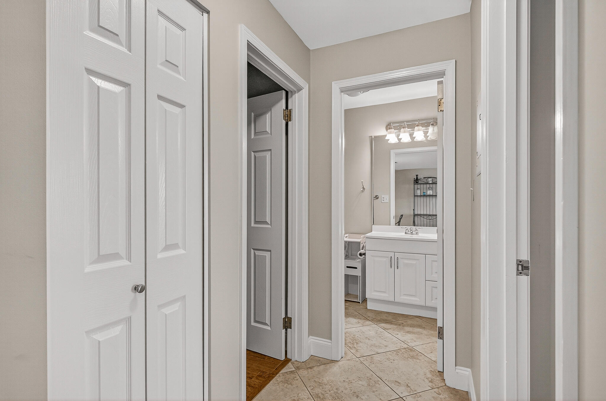 195 Durango Road, Unit 2D Destin, FL 32541 - Photo 37 of 62 a bathroom with white cabinets and sink