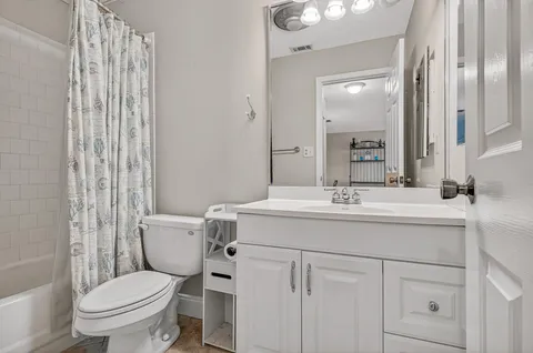 a view of a balcony with chairs