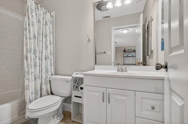 a view of a balcony with chairs