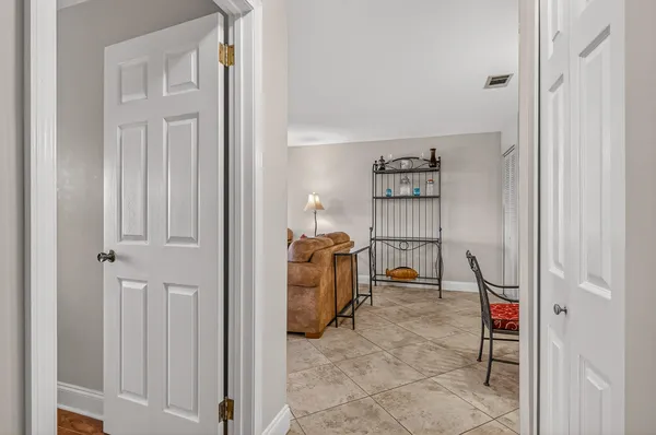 a living room with furniture and a window