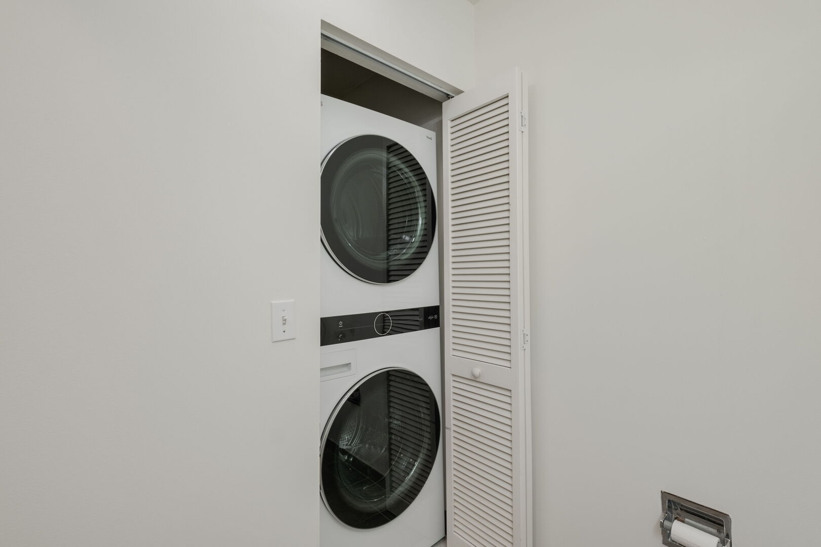 720 West Randolph Street, Unit 905 Chicago, IL 60661 - Photo 13 of 30 a close up view of a washer and dryer
