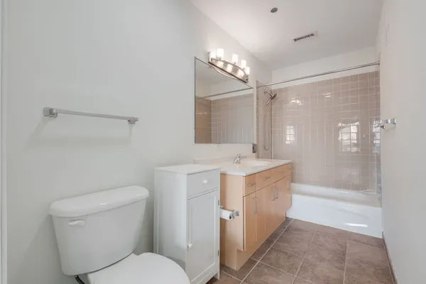 a view of a balcony with chairs