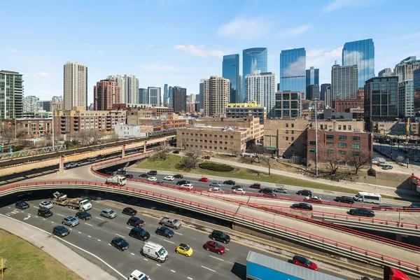 a view of a city with tall buildings