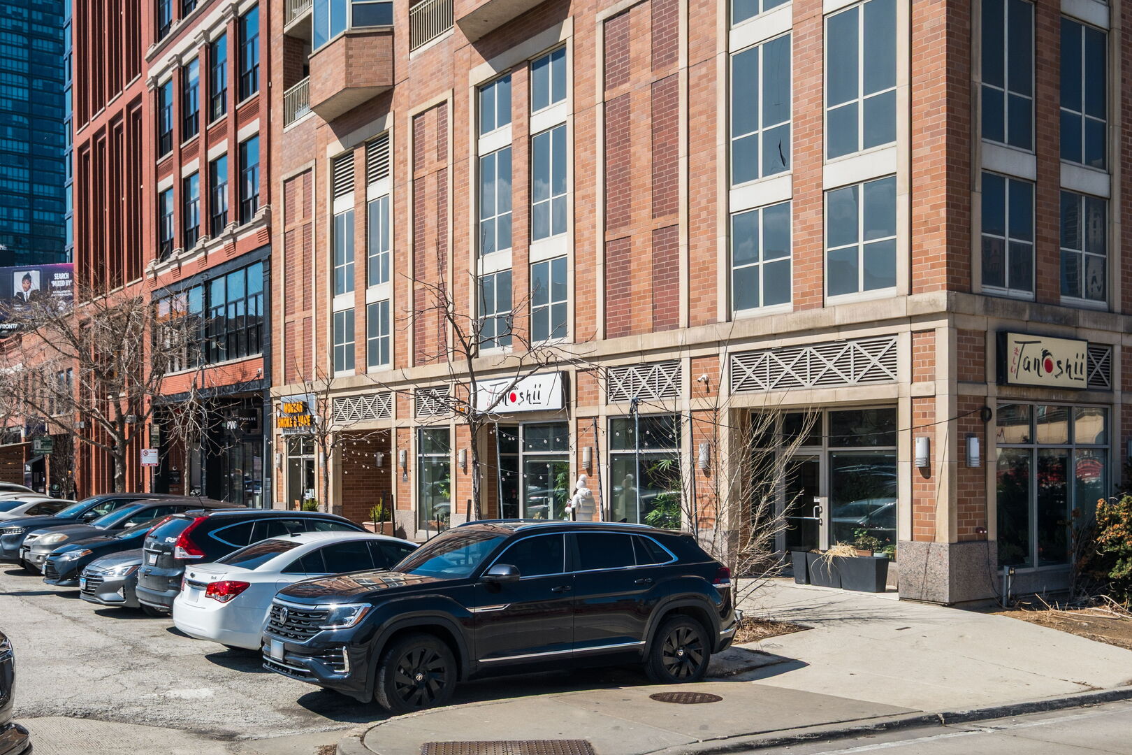 720 West Randolph Street, Unit 905 Chicago, IL 60661 - Photo 29 of 30 a view of a car parked in front of a building
