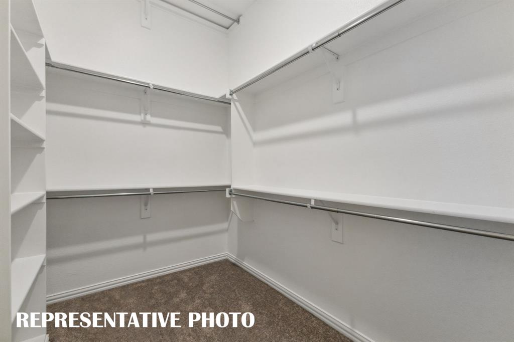 1027 Splitrock Drive Allen, TX 75013 - Photo 11 of 18 a view of an empty walk in closet