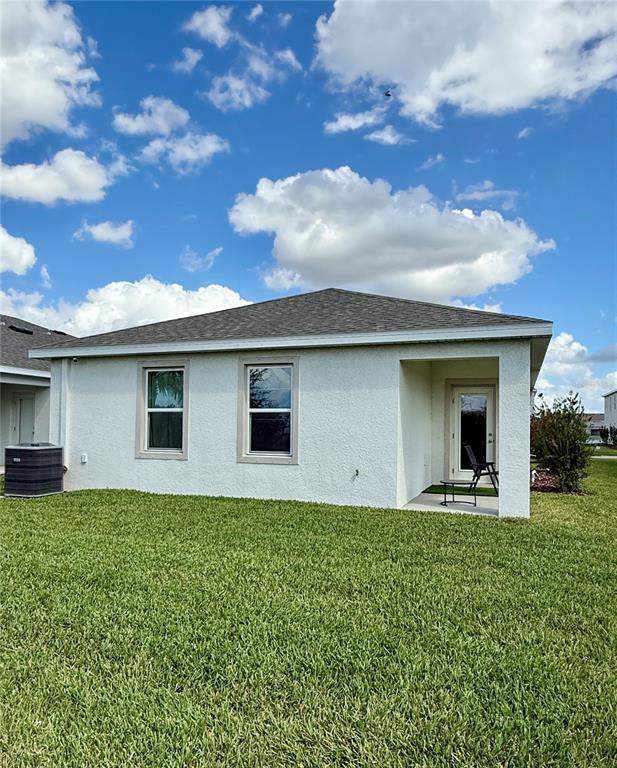 3222 Bitterroot Lane Bradenton, FL 34211 - Photo 3 of 34 a front view of a house with garden