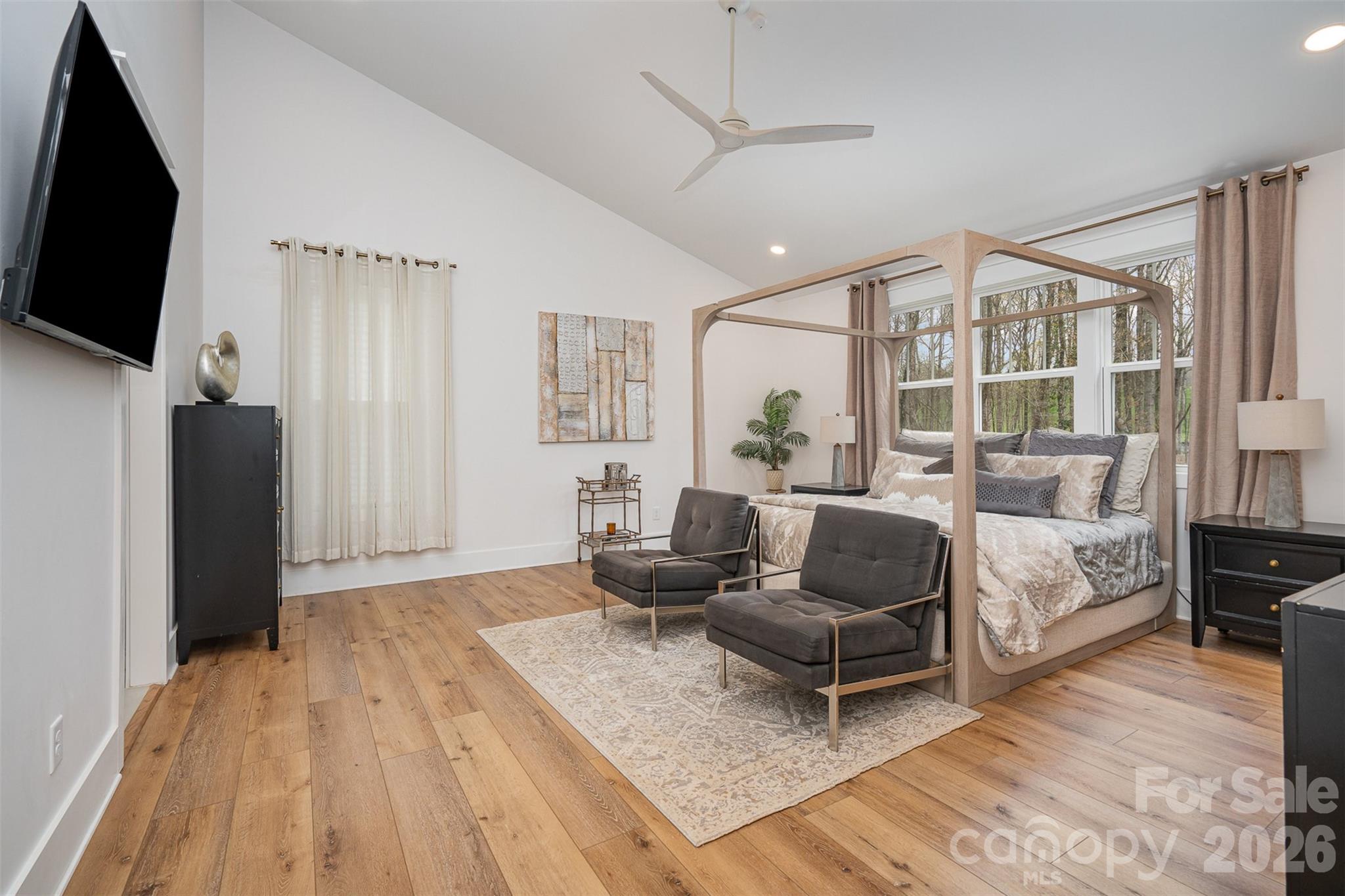 4125 Spring Street Charlotte, NC 28270 - Photo 17 of 37 a living room with furniture and a flat screen tv