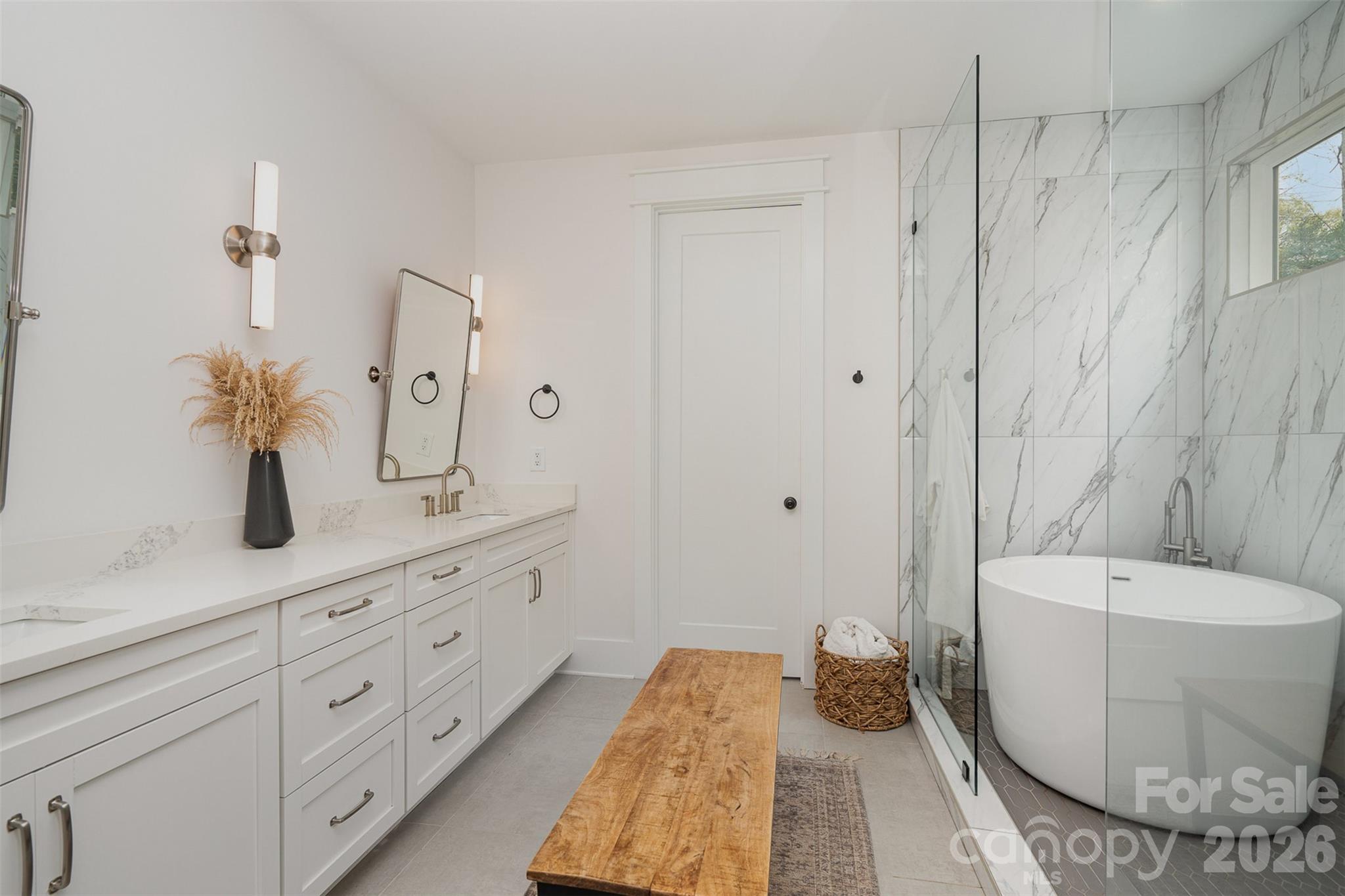 4125 Spring Street Charlotte, NC 28270 - Photo 19 of 37 a spacious bathroom with a double vanity sink and a mirror