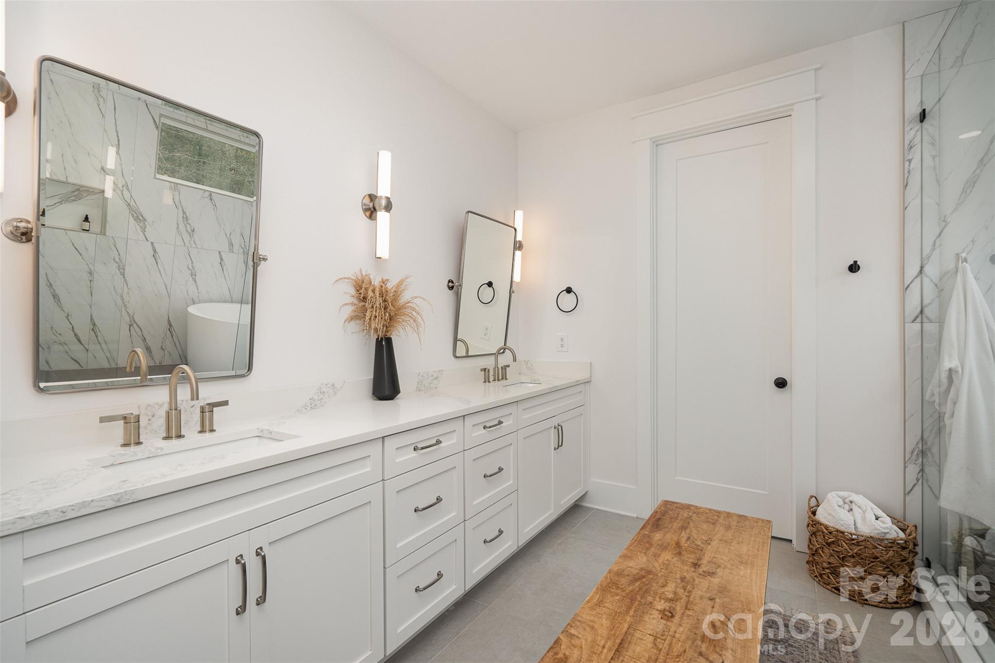 4125 Spring Street Charlotte, NC 28270 - Photo 20 of 37 a bathroom with double sink and a mirror