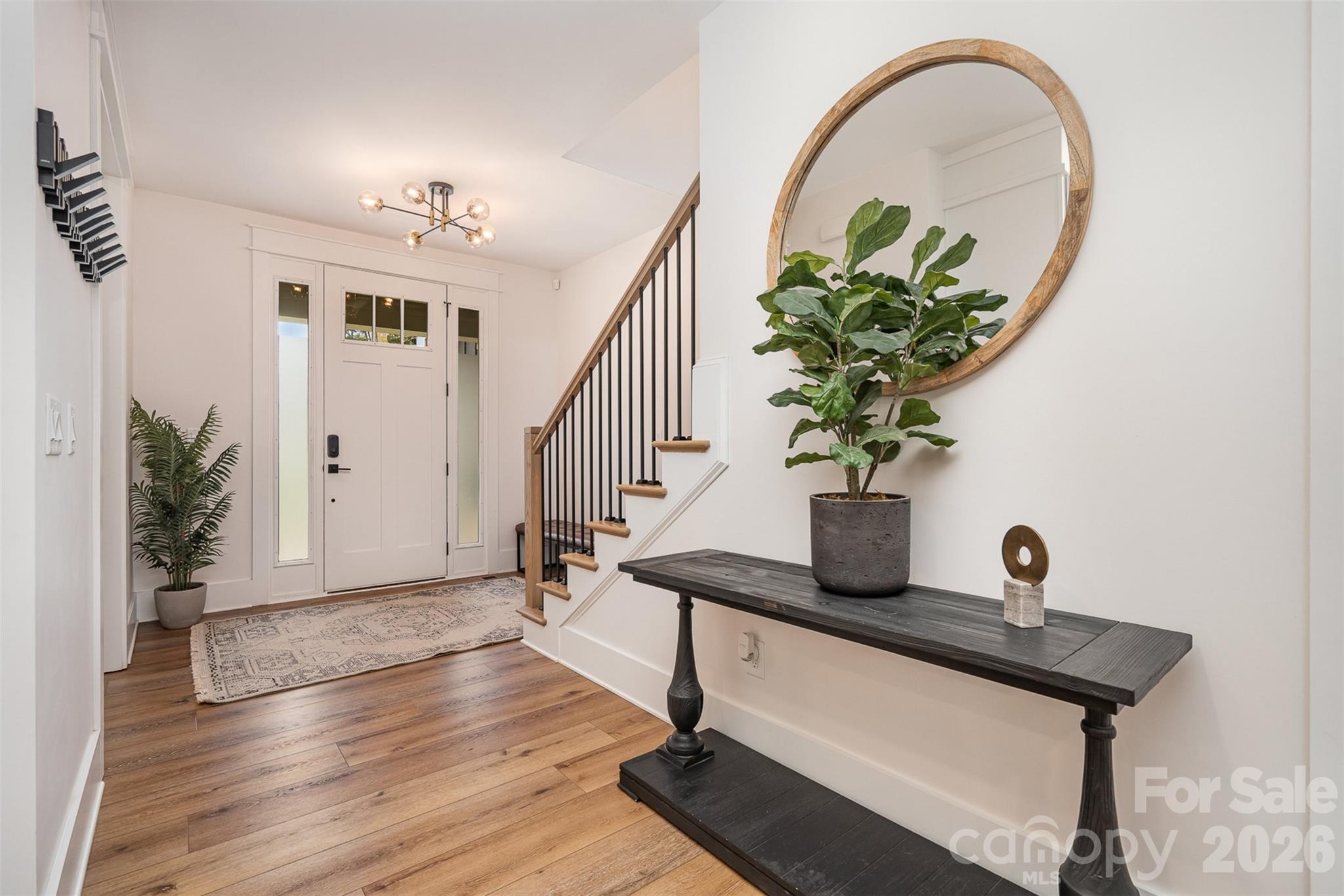 4125 Spring Street Charlotte, NC 28270 - Photo 3 of 37 a view of entryway with wooden floor
