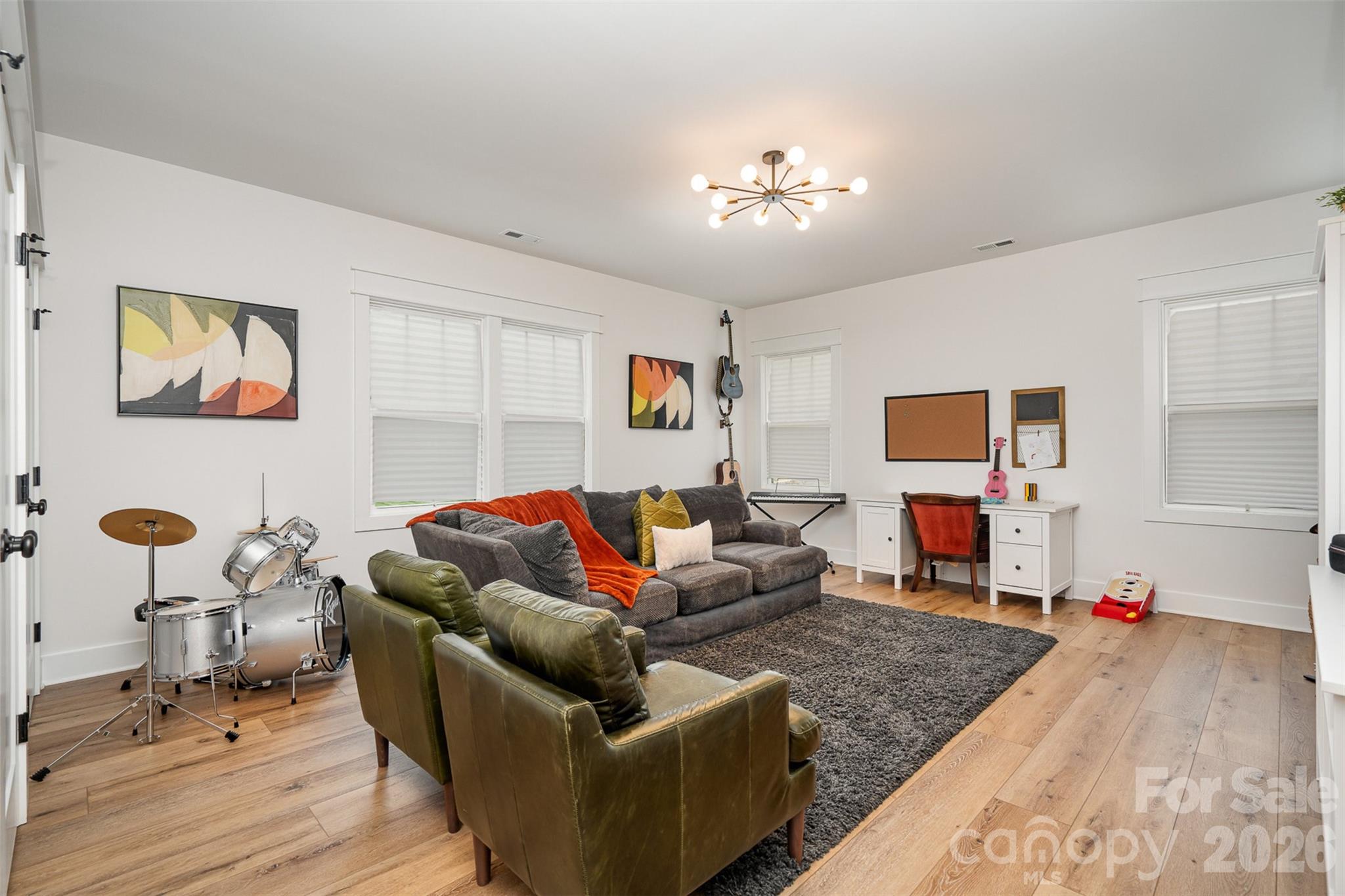 4125 Spring Street Charlotte, NC 28270 - Photo 31 of 37 a living room with furniture and wooden floor