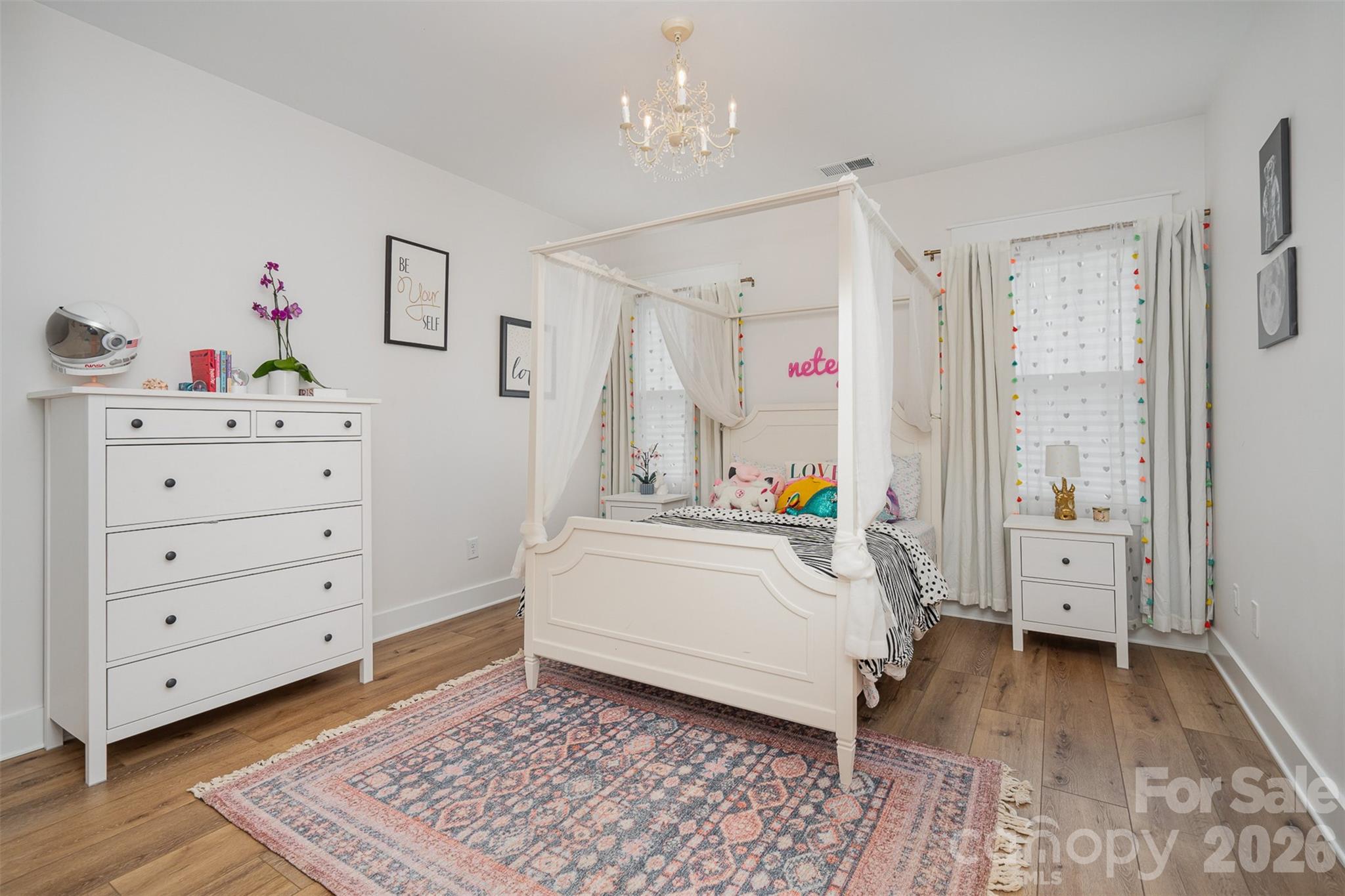 4125 Spring Street Charlotte, NC 28270 - Photo 32 of 37 a view of a bedroom with baby bed and bedroom