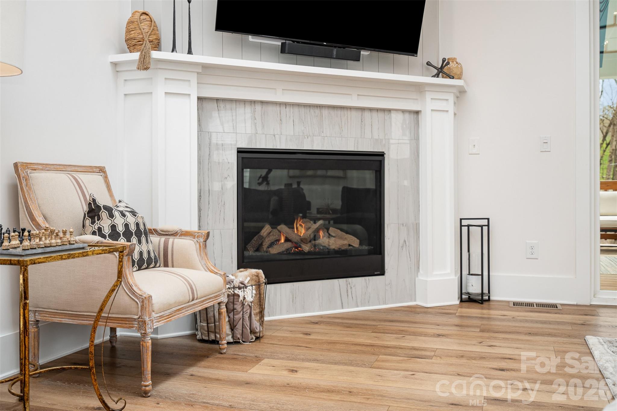 4125 Spring Street Charlotte, NC 28270 - Photo 7 of 37 a living room with furniture and a fireplace