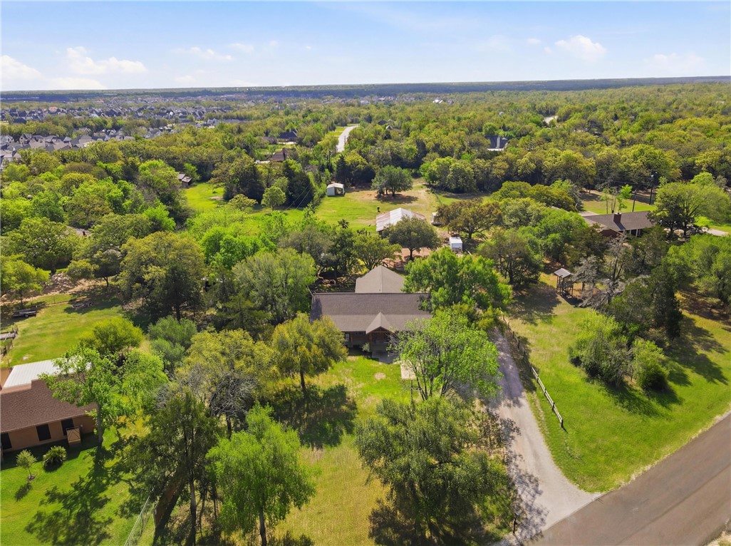 2302 Quail Run College Station, TX 77845 - Photo 47 of 49 an aerial view of residential houses with outdoor space and trees