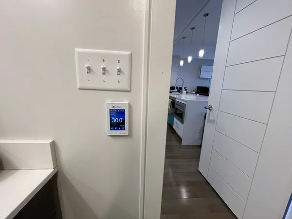 a bathroom with a sink and mirror
