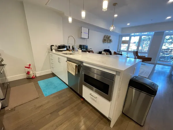 a kitchen with a stove and a microwave
