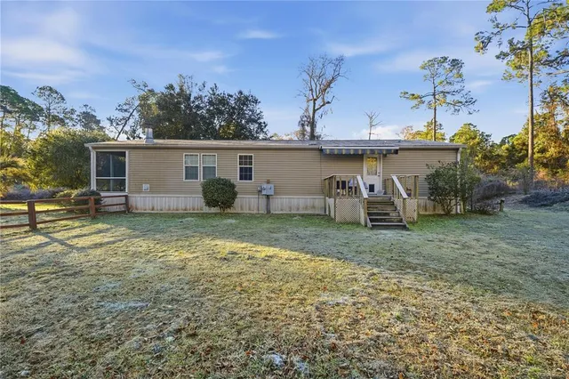 a view of a tiny house with a trees