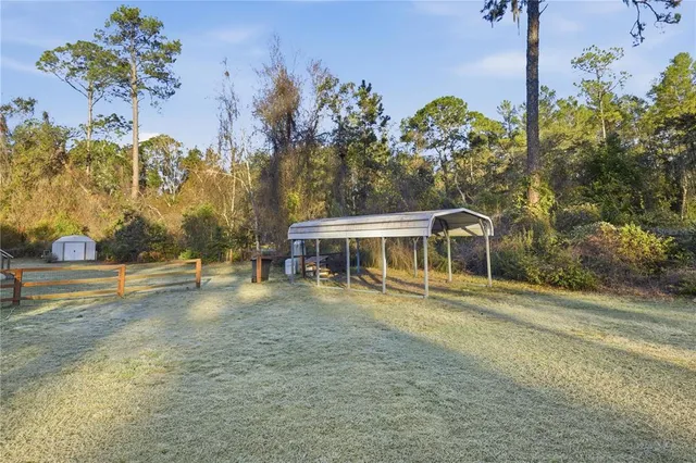a house with trees in the background