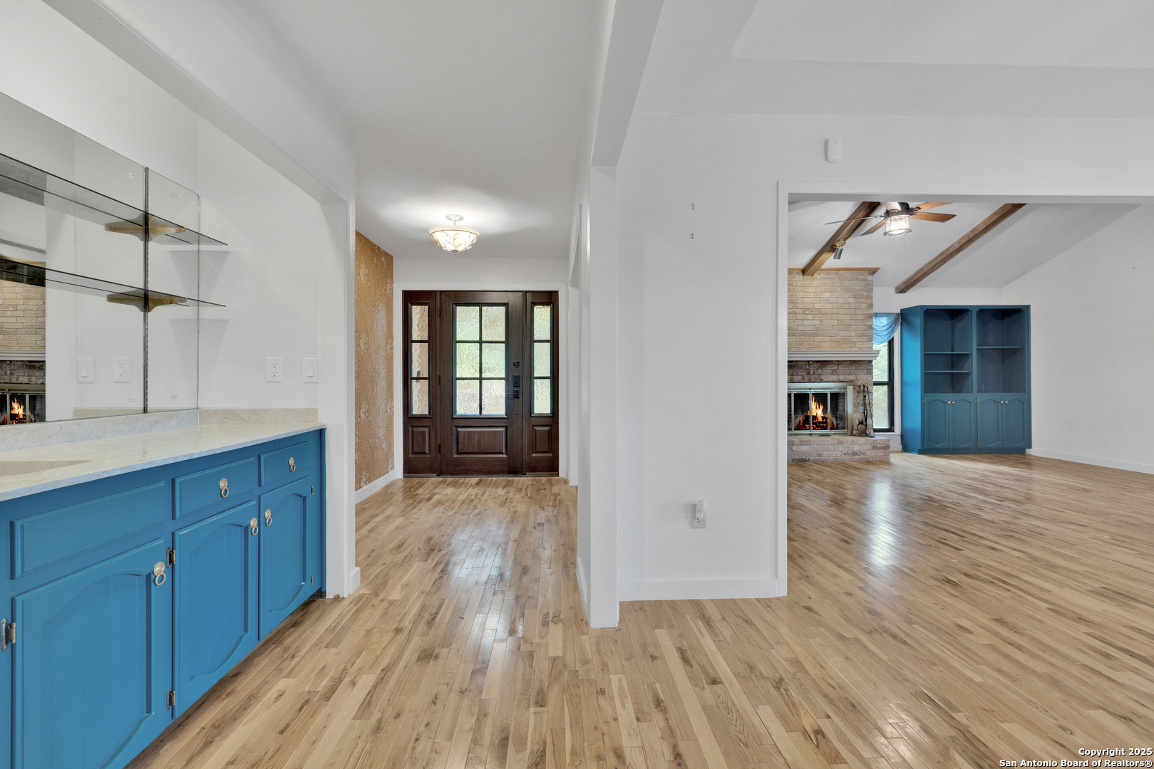 11361 Moonsail Helotes, TX 78023 - Photo 11 of 27 wooden floor in an empty room